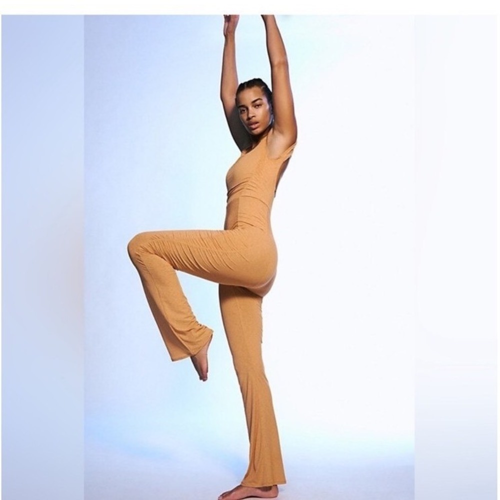 FREE PEOPLE  FP Movement Pirouette Flare Jumpsuit in Orange Size Small
